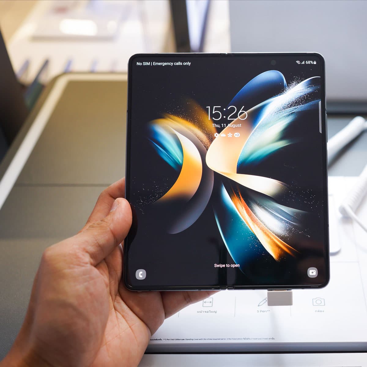 Crease-free foldables shown through a Samsung foldable smartphone in use