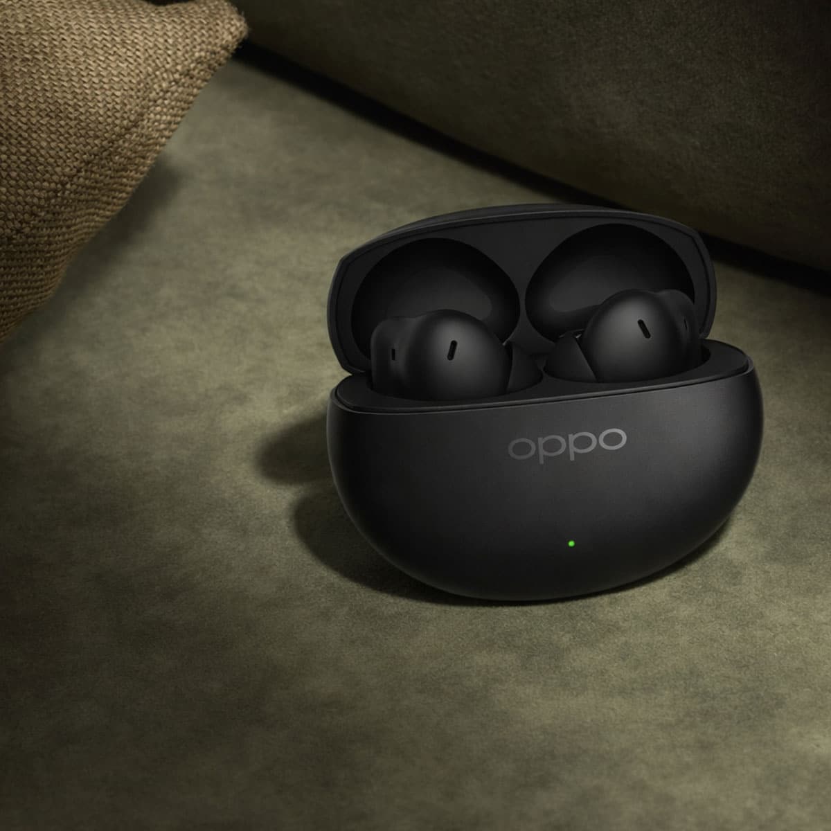 AI Earbuds OPPO Enco Air 5 Pro in black charging case on textured background