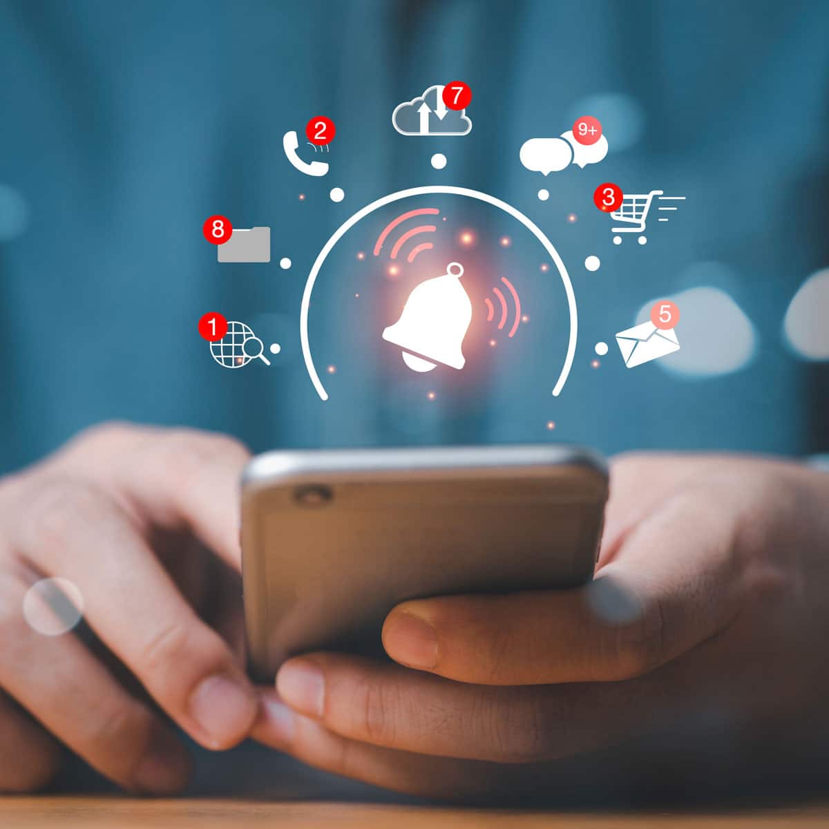 Smartphone notifications displayed above a mobile phone as a user checks incoming alerts on their device.